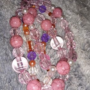 3 one of a kind pink bracelets